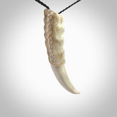 Hand carved incredible dragon claw Bone carving. A stunning work of art, beautifully replicating a dragon claw. This pendant was hand carved in bone by Fumio Noguchi. A one off collectors item that has been hand crafted to be worn or displayed.